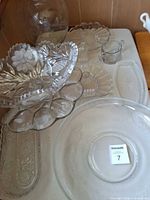 Multiple clear glass pieces displayed together