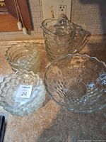 Pitcher, large bowl, three bowls shown together