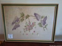 Full view of framed embroidery