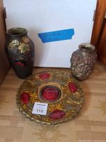 Group shot of two vases and plate showing overall appearance