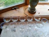 Top view of multiple iridescent coupe glasses on table