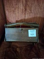 Front view of wooden sewing basket