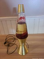 Full view of lava lamp unlit on tabletop