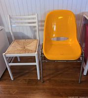 Both chairs side by side showing overall design and size difference