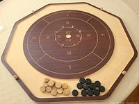 Full view of crokinole board with all discs displayed