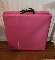 Pink Balancefrom mat folded, showing square form and logo