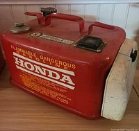 Overall view showing Honda logo and carry handle