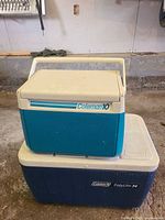 Both coolers stacked closed showing exterior colors and branding