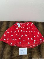 Front view of red heart tutu skirt laid flat