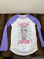 Full view of tee showing sleeves and body