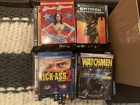 Top view showing Wonder Woman, Batman: Gotham Knight, Kick-Ass, Watchmen cases