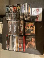 Overall view showing four James Bond box sets and additional DVD titles