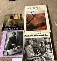 All four books laid out showing covers