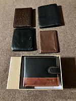 All five wallets front view