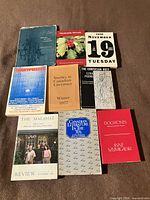 All nine books laid out showing covers