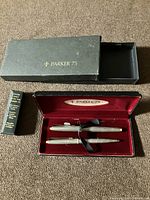 Set displayed with presentation case, outer box and converter box