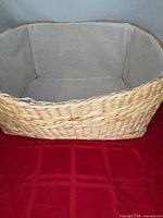Top view of lined wicker basket interior and weave