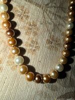 Close view of centre beads showing four colours and surface condition