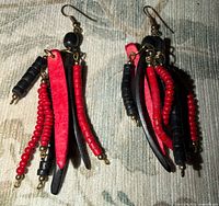 Front view of both earrings showing wooden slats, beads and hooks
