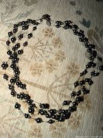 Full view of necklace showing multiple strands and bead arrangement