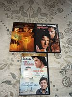 All three DVD cases front covers visible