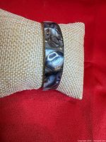 Front view of marbled enamel cuff bracelet