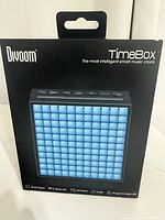 Front of boxed Divoom TimeBox showing product image and branding