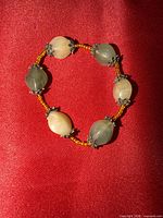 Full view of stretch bracelet laid flat showing all stone beads and spacers