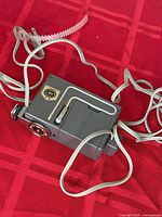 overall view of grey flash unit with cords