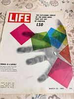 Front cover showing title, headline, graphics, price