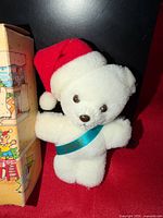 Front view of bear ornament with box