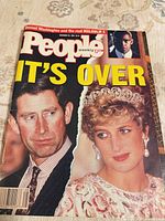 Front cover showing Prince Charles and Princess Diana with headline IT'S OVER