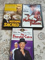 All three DVD cases front view