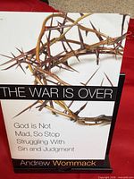 Front cover of the book showing title, author and crown-of-thorns image