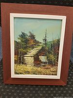 Full view of framed painting showing subject and frame