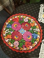 Round multicolor floral embroidered doily