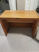 Closed teakwood vanity front and side view