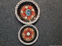 Both plates front view showing sizes and artwork