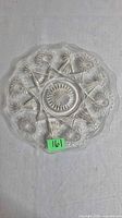 Top view showing full starburst pattern and scalloped edge