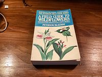 Front cover of the field guide book