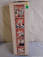 Full view of original cardboard box with graphic panels