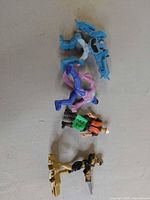 All four action figures lined up for overall view