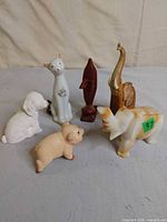 Group shot of all six animal statuettes