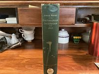 Spine view showing title, year, wear at top, page count label