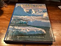 Front cover of Antarctica: The Blue Continent book showing title, subtitle and authors