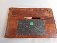Overall view of cheeseboard, slate insert, and knife