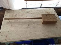 Full view of cigar box guitar on table