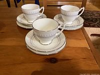 Full set of three trios stacked showing pattern and trim