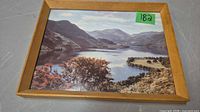 Front view of framed landscape print