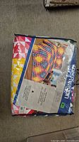 Front of packaged quilt set showing pattern and labeling